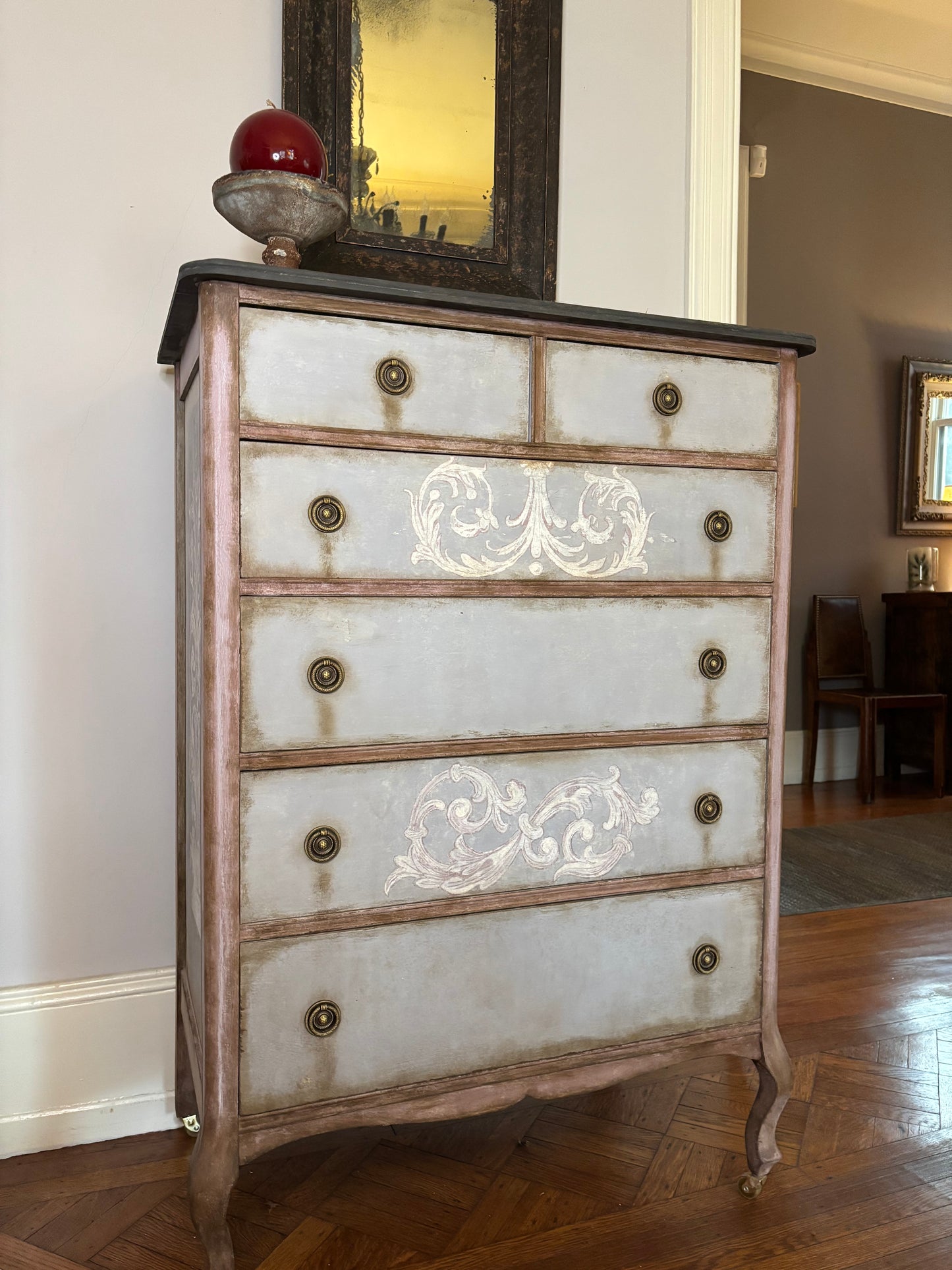 Tall boy,  six drawers, light blue, baroque flourish hand painted. Distressed graphite silky top