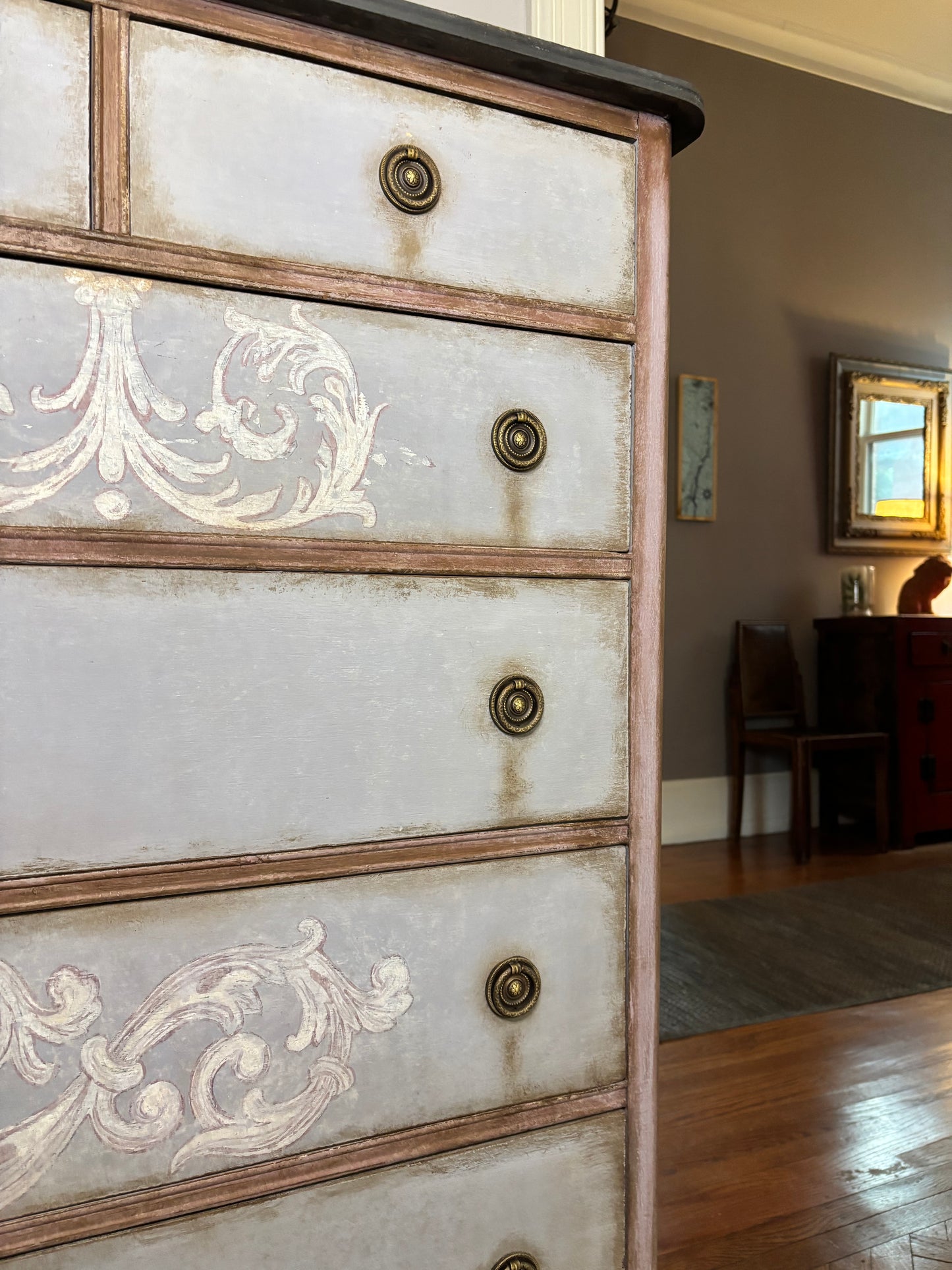 Tall boy,  six drawers, light blue, baroque flourish hand painted. Distressed graphite silky top