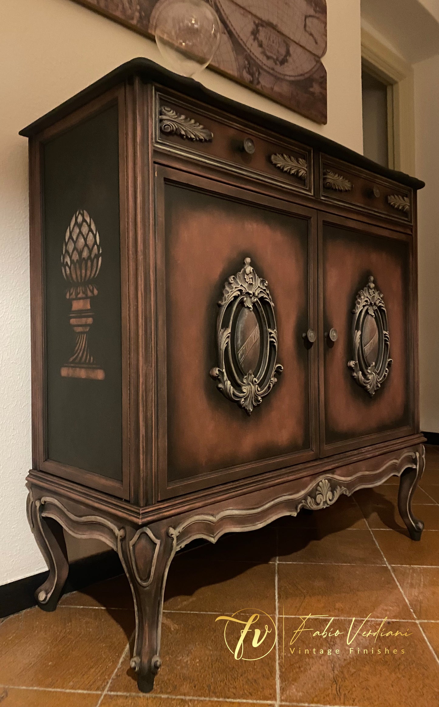 Small cabinet. Annie Sloan Graphite, dry brushing in Primer Red and details in Versailles Yellow. Stencils on each side, clear  and black wax.