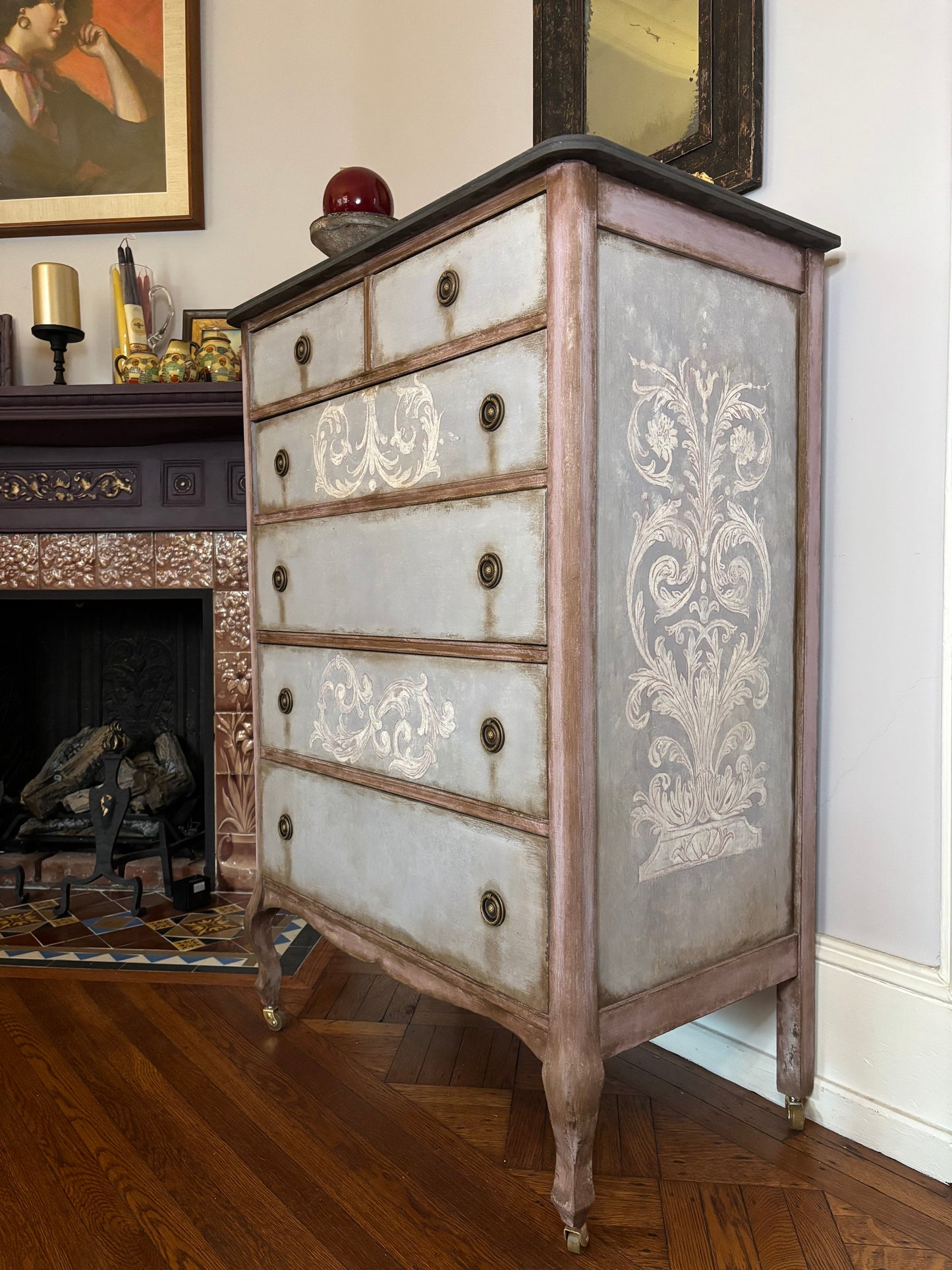 Tall boy,  six drawers, light blue, baroque flourish hand painted. Distressed graphite silky top