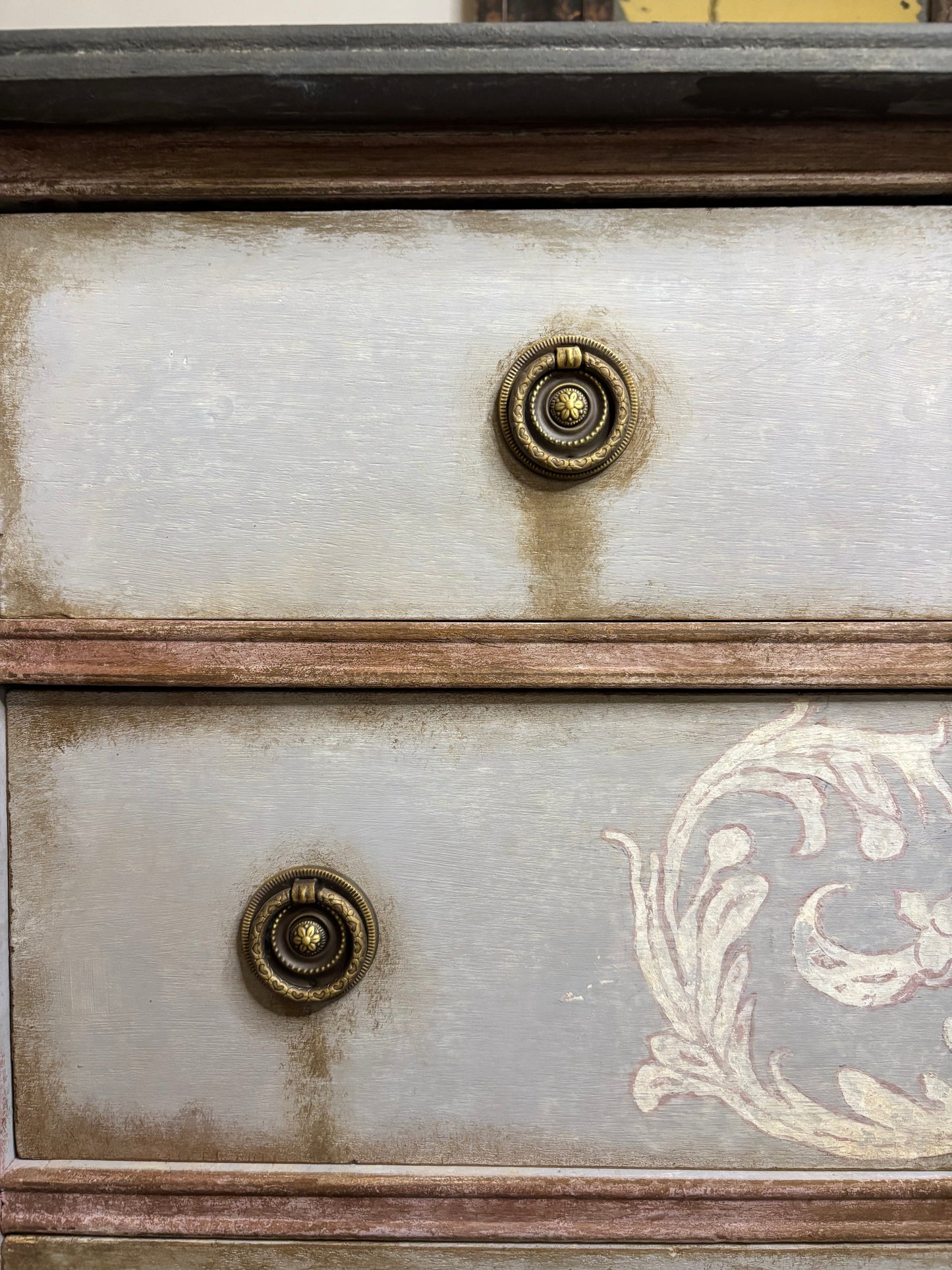 Tall boy,  six drawers, light blue, baroque flourish hand painted. Distressed graphite silky top