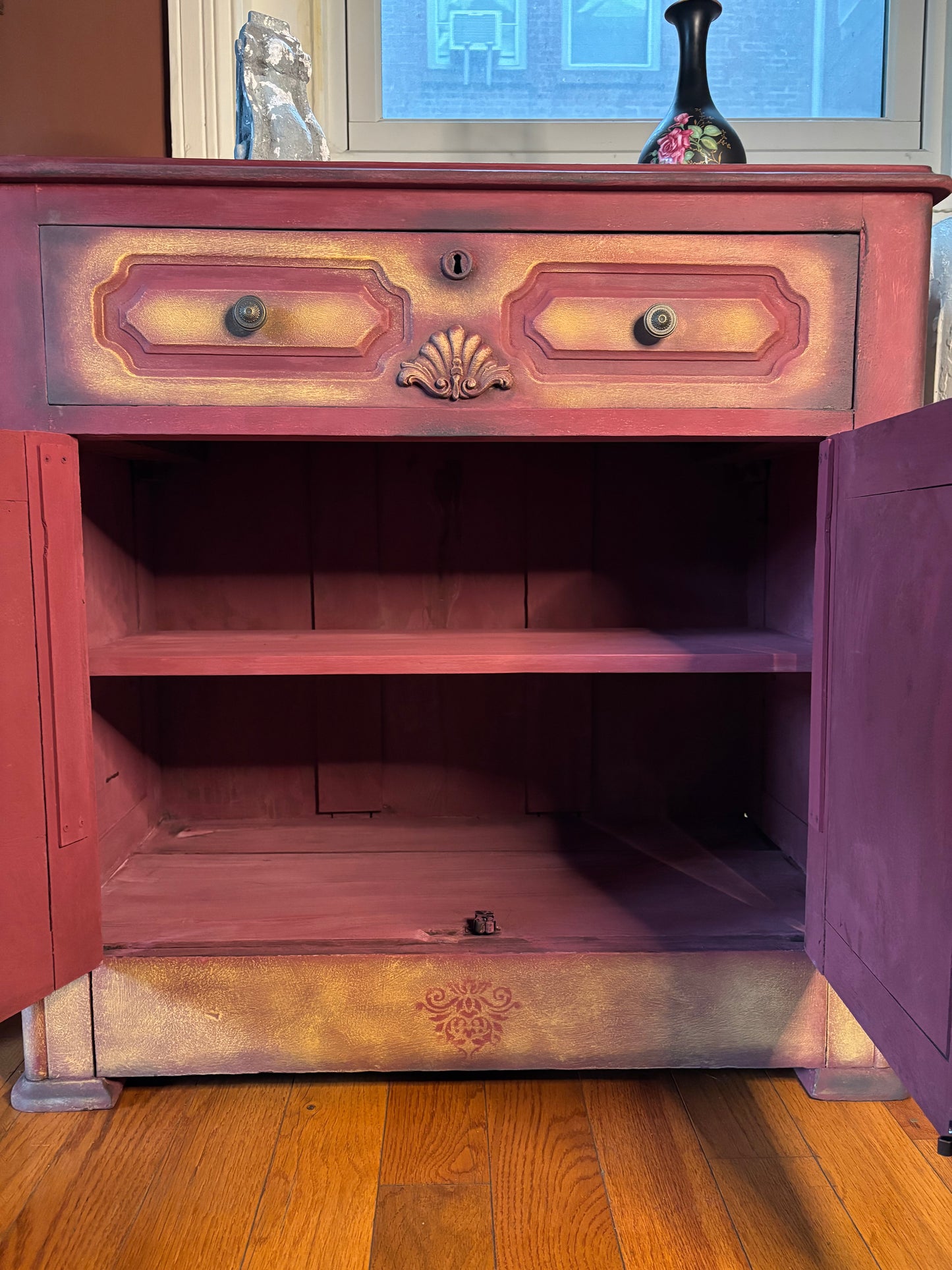 Small vintage cabinet in  Burgundy Chalk Paint, dry brushing in Yellow and some shades of Graphite.