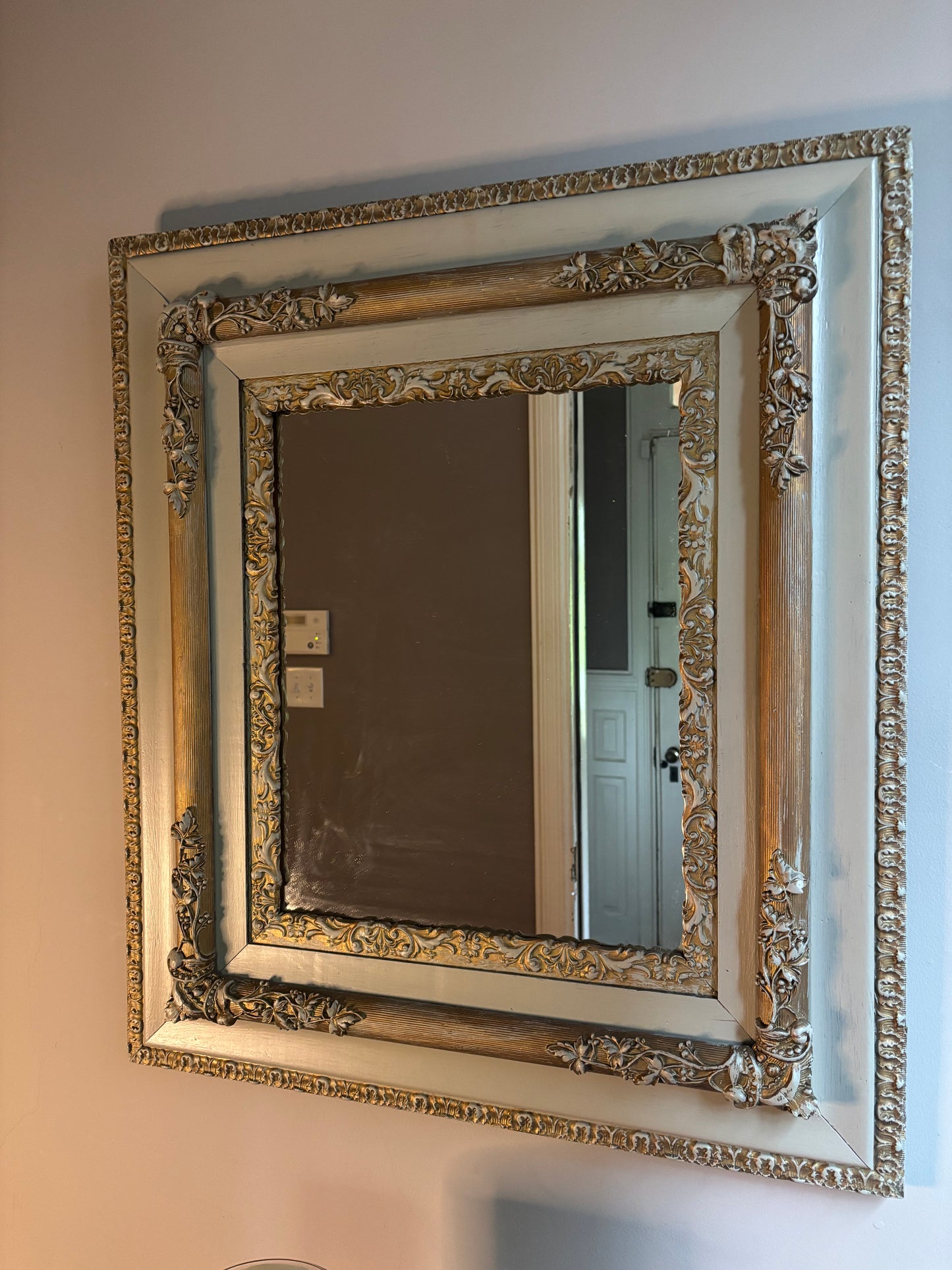 Grey rectangular mirror  with golden decorative molding