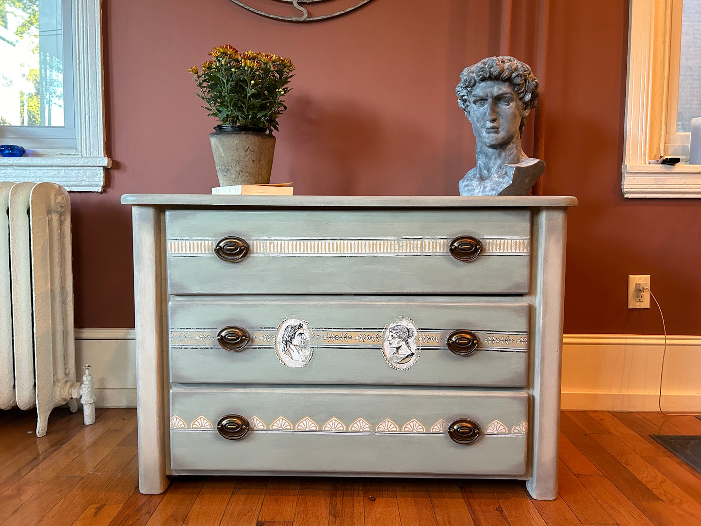 Solid pine chest of drawers in Annie Sloan Coolabah Green, Country Gray and French Linen Chalk Paint®,“Classical Cameos” IOD/AS inlay