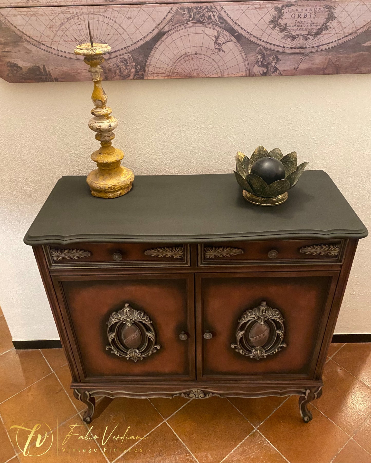 Small cabinet. Annie Sloan Graphite, dry brushing in Primer Red and details in Versailles Yellow. Stencils on each side, clear  and black wax.