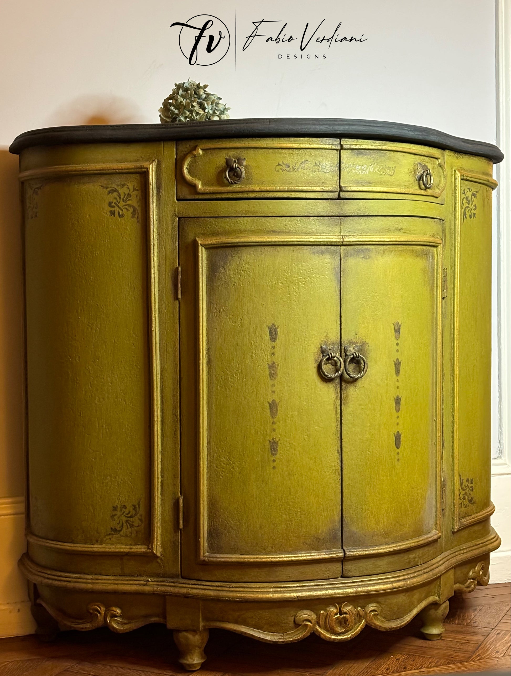 Small Round Italian Credenza - Olive Oil Green Body, Graphite Top, Stenciled Details,  Gold Trims – Tempera Technique view from left and front