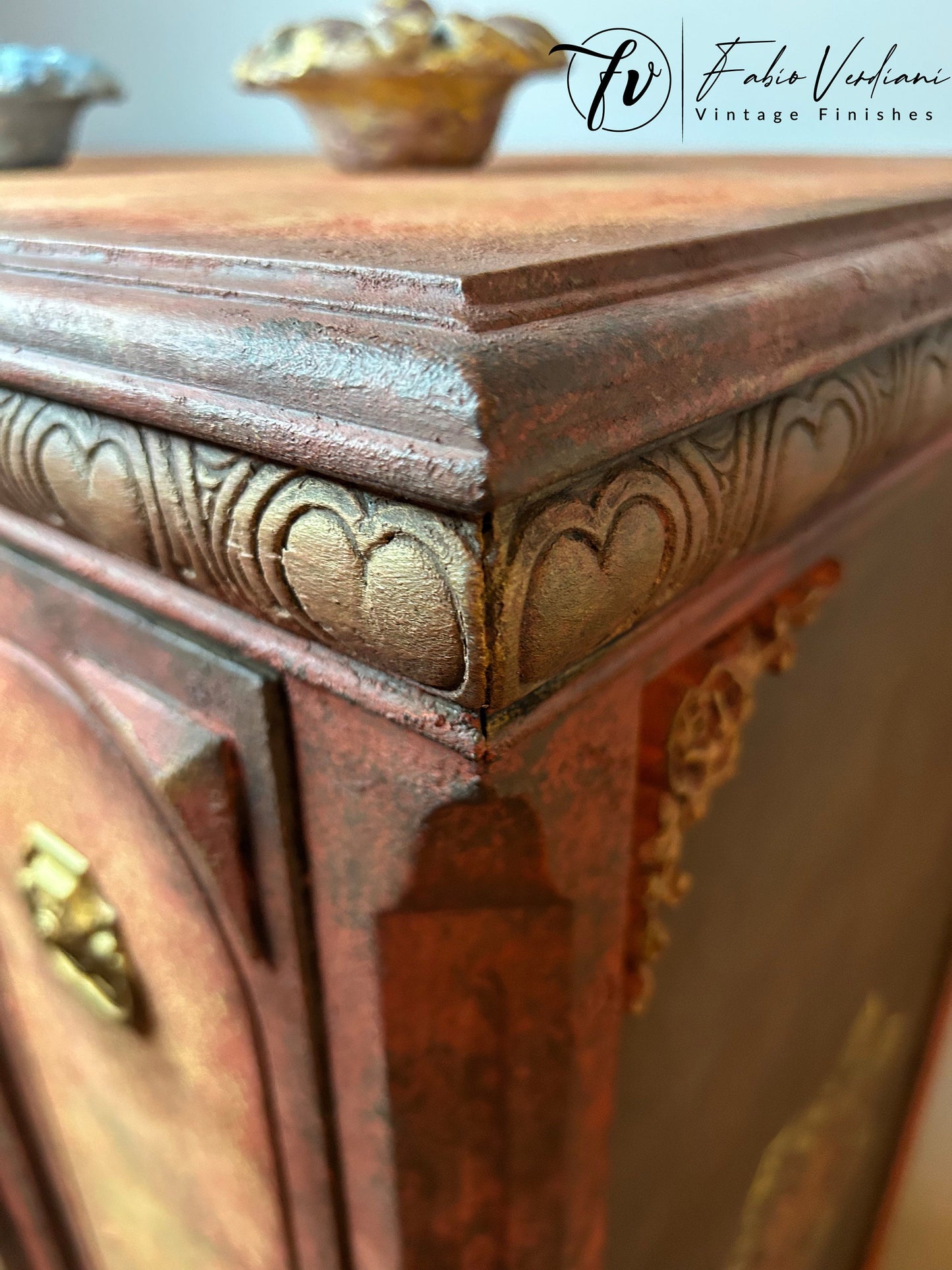 Tall Dresser Red and Yellow Moroccan Thirties style with moldings corner close up