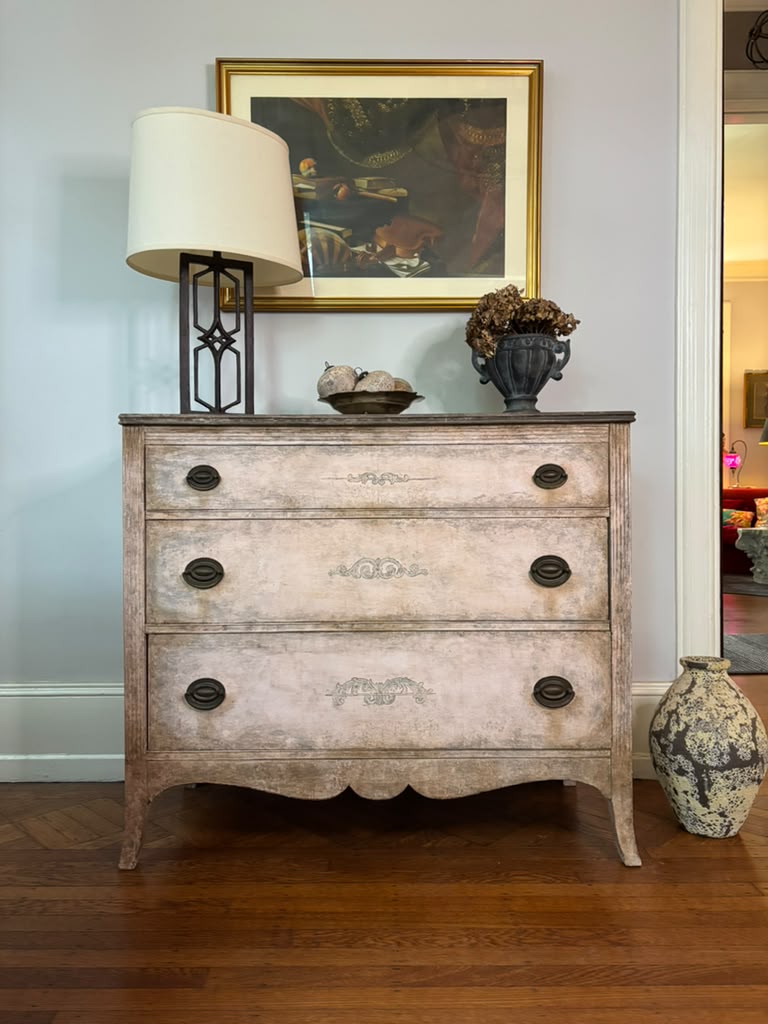 Vintage chest of drawers,  hand-finished limestone patina, subtle ornamental details, and rich bronze hardware for understated European elegance