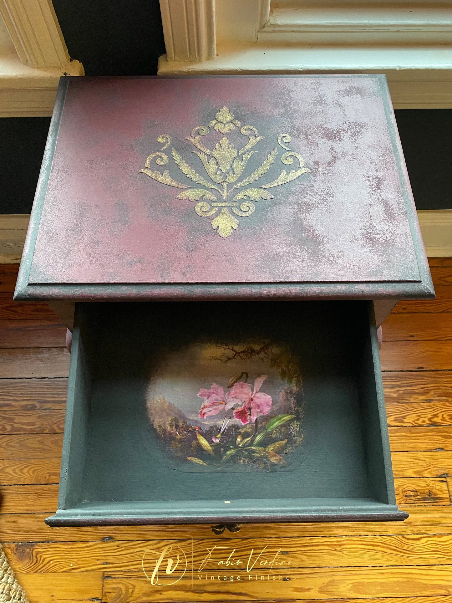 Coffee Table in Graphite and Orchid chalk paint, old gold  top stencil and moldings, orchid shaped hardware, inside drawer decoupage